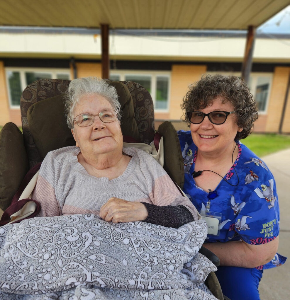 resident with staff member at long term care Marian Manor skilled nursing home in north dakota